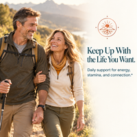 Active mature couple hiking beside maca root energy and stamina support messaging